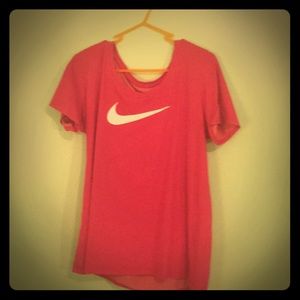 Athletic DRI-FIT Nike shirt.